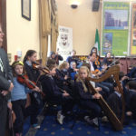The band playing.